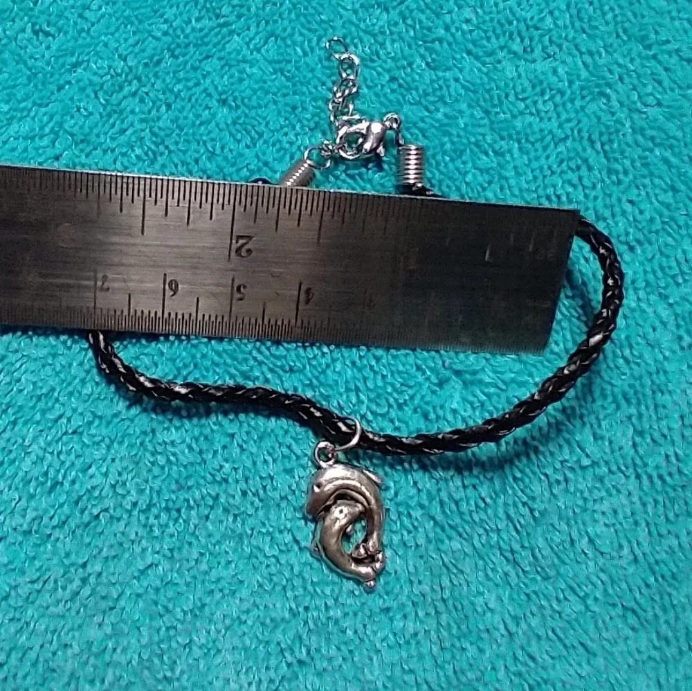 Black braided cord silvertone dolphins couple bracelet